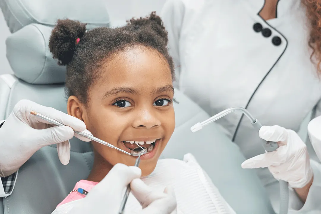 Smiling child in the dental chair