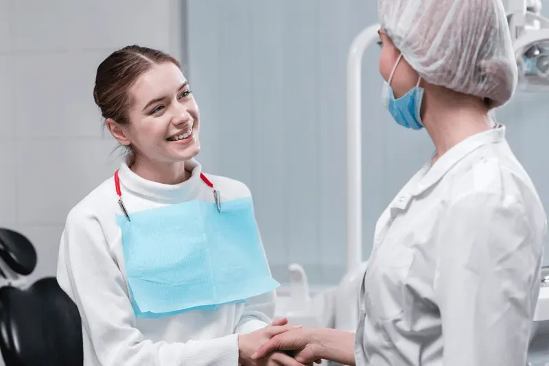 Dentist greeting a new patient